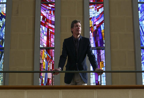 Bishop David Rice surveys the interior of Waiapu Cathedral.