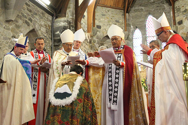 The bishops extend their hands in blessing and prayer over our new archbishop.