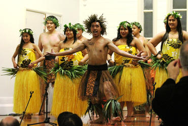 Laamauga Fagu leading a Rarotonga dance performed by a combined group from the Ekalesia Agelekana Samoa, and the Tongan congregation from Otahuhu.