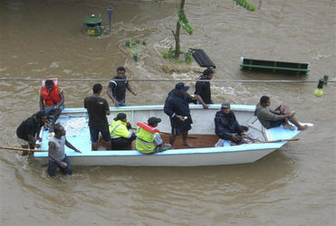 A boat joins the rescue effort in Nadi.