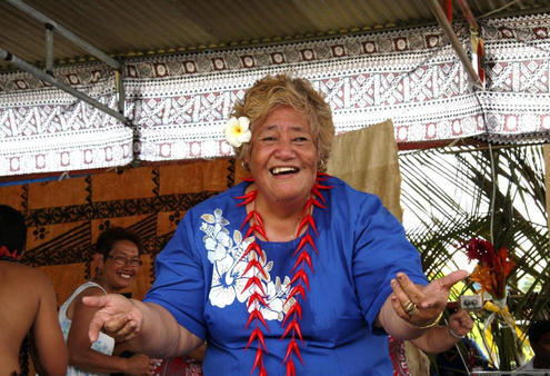 Christina Tapu gets into the swing of the Samoan cultural presentation at Fiji's centenary. 