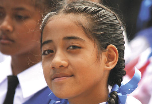 Young people delighted in the spectacle of Tonga's coronation. 