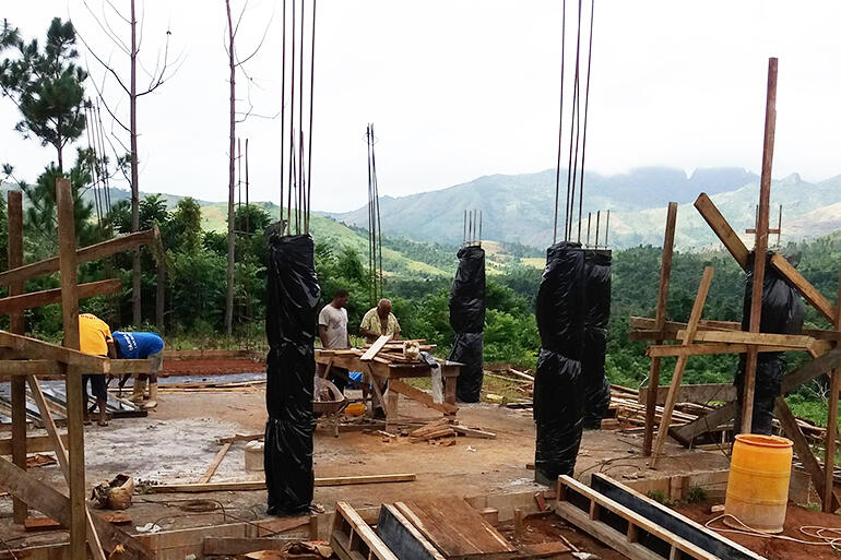 The concrete for the columns which will support the roof beams in the Church of the Resurrection has just been poured.