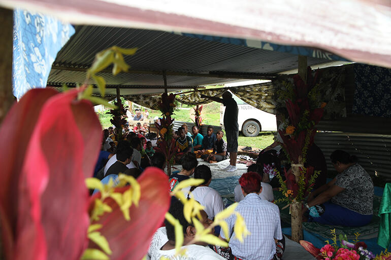 Archbishop Winston talked to the gathered community and the TYE before blessing the new church foundations.