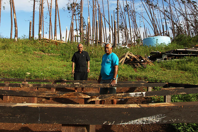 Flashback to February: Archbishop Winston and Diocesan Secretary John Simmonds in the ruined dormitory.