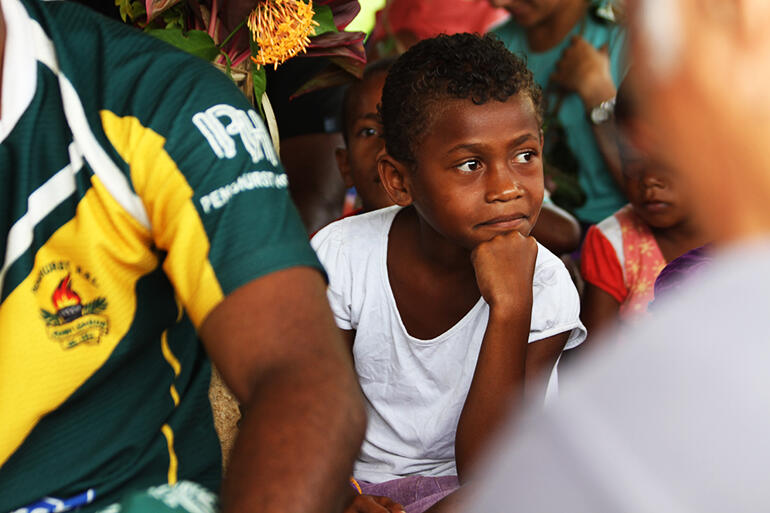 The young people of the koro took part in the briefing before the church foundations were dug.