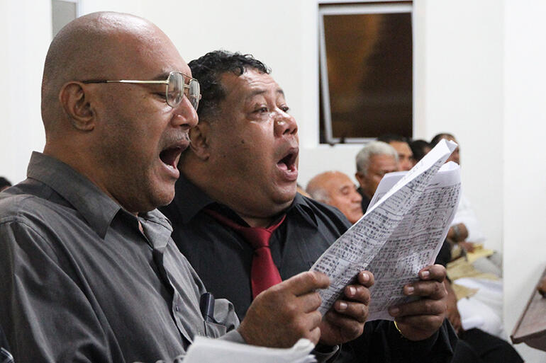 Giving it heaps: Fine Tukuafu and Paula Moa from one of the Sunday evening church choirs.