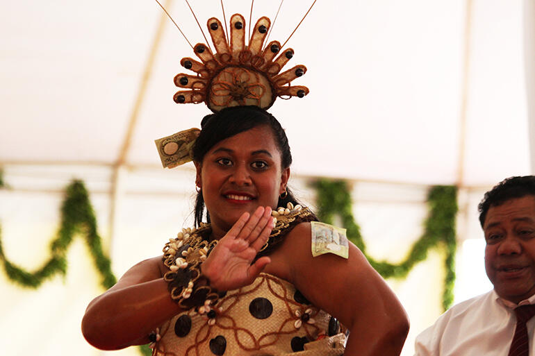 That's Latai Ofa from St Barnabas performing the Ta'olunga before the Tongan Queen Mother at the Saturday feast.