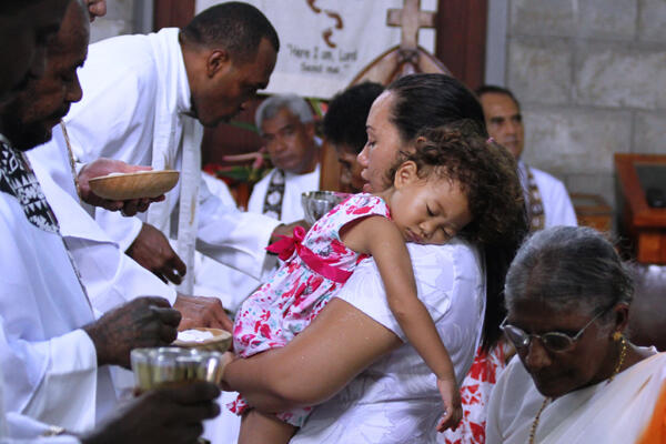 Mum makes her communion - while her daughter is dead to the world, alive to Christ. Mum makes her communion - while her daughter is dead to the world, alive to Christ.