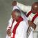 Archdeacobn Tui Finau of Tonga drapes the cope over Bishop Winston's shoulders.