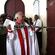 Bishop Winston strikes the Great West Doors three times with the Diocesan Pastoral Staff.