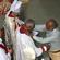 Dr Sitiveni Halapua drapes the pectoral cross around his brother's neck.