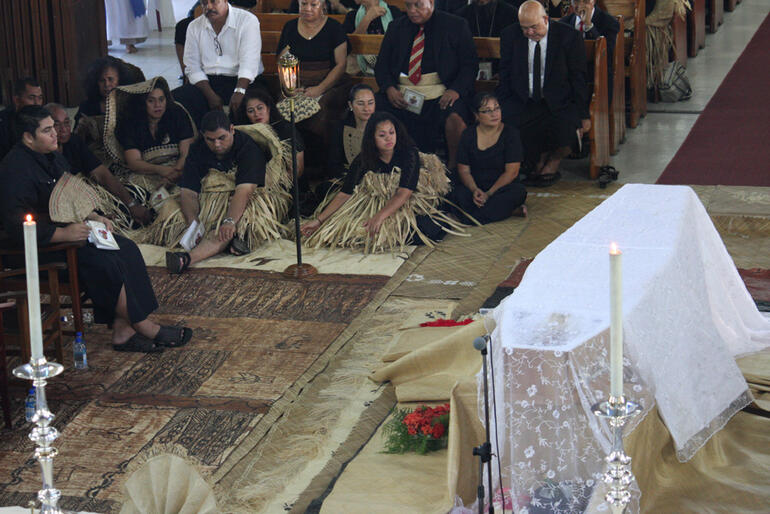The late bishop's two children, Jonathan and Fitaloa, are in the front of the seated group - with Prince Tungi, of Tonga, at left.