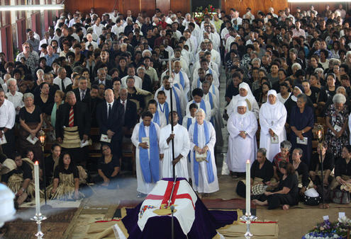 The lying in state over, the lay ministers and clergy process into the cathedral for the thanksgiving service.