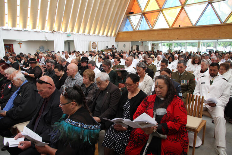 Representatives from Te Hui Amorangi o Te Upoko o Te Ika join mourners in the Cathedral yesterday.
