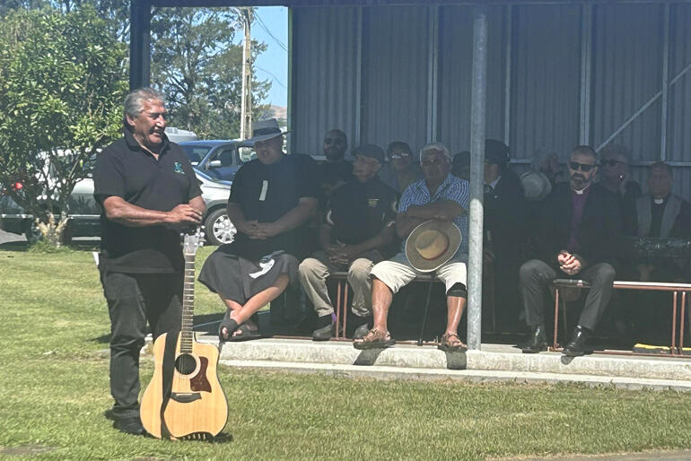 Ngāti Kahungungu leader Ngahiwi Tomoana honours Bishop Richard at Waipatu as Bishop Andrew Hedge and kaumatua look on.