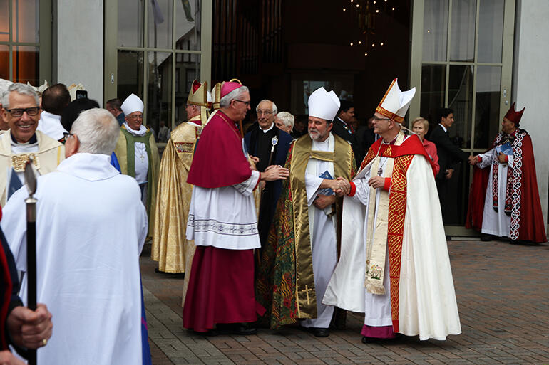 After service greetings: The Catholic Bishop of Auckland, Patrick Dunn, Archbishop Philip Richardson and the Assistant Bishop of Auckland, Jim White