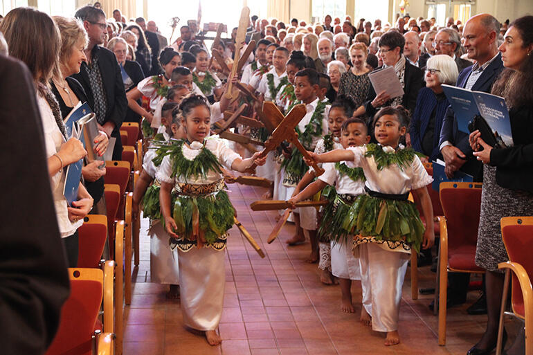 Lights, camera, action! Children from the Diocese of Polynesia form the vanguard for the gospel procession.