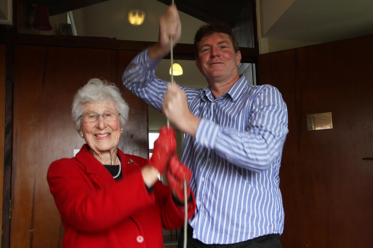 Alice Wylie and her grandson Tim Bennett, road-testing the reconnected bell. Alice Wylie and her grandson Tim Bennett, road-testing the reconnected bell.