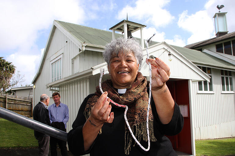 The Rev Jacynthia Murphy, priest in charge at St Martin's at St Chad's, with the remnant of the old bell rope. The Rev Jacynthia Murphy, priest in charge at St Martin's at St Chad's, with the remnant of the old bell rope.