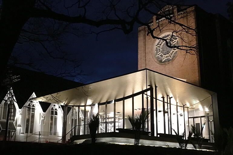 Inner glow - a nighttime view of the chapel named for Bishop Selwyn.