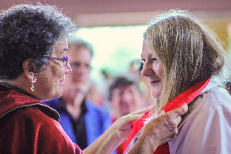 Archdeacon Wendy Scott greets new priest Rev Fiona Thomson from the parish of Pauatahanui.