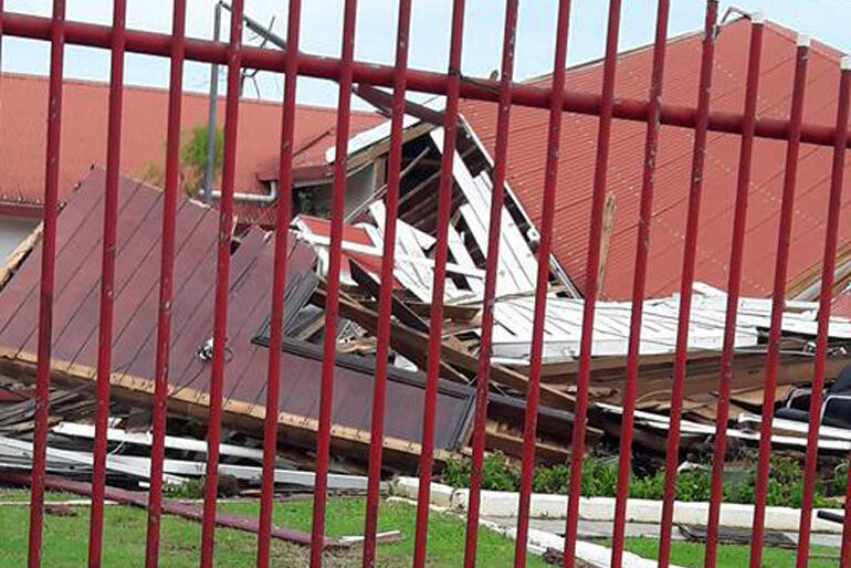 Institutions toppled: the old Parliament buildings in downtown Nuku'alofa: Pic by Rev Sione Uluilakepa.