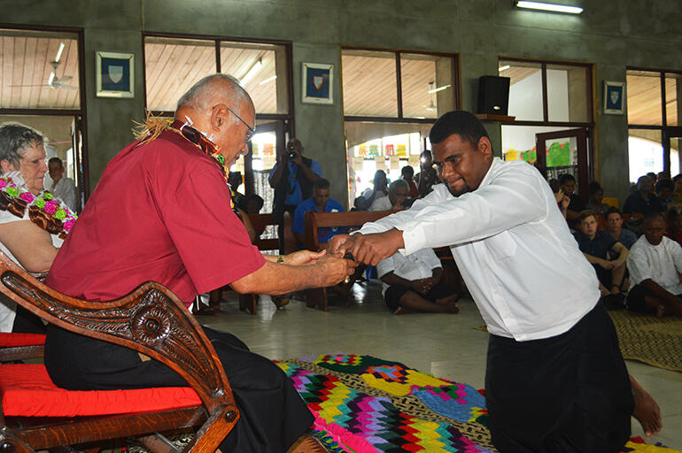 Archbishop Winston is served kava during the traditional ceremony which took place after the church service. Archbishop Winston is served kava during the traditional ceremony which took place after the church service.