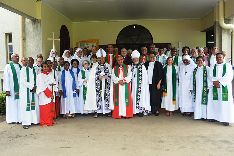 Bishops and clergy gathered on the cathedral steps after the service.