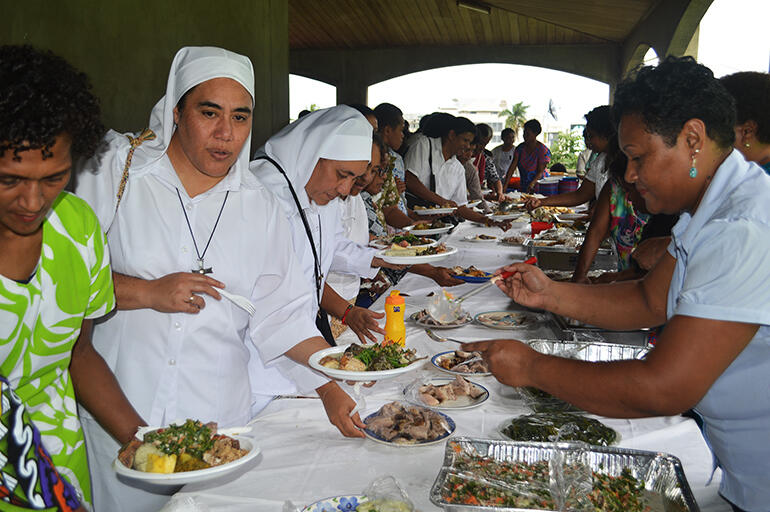 Feast time on the cathedral verandah. Feast time on the cathedral verandah.