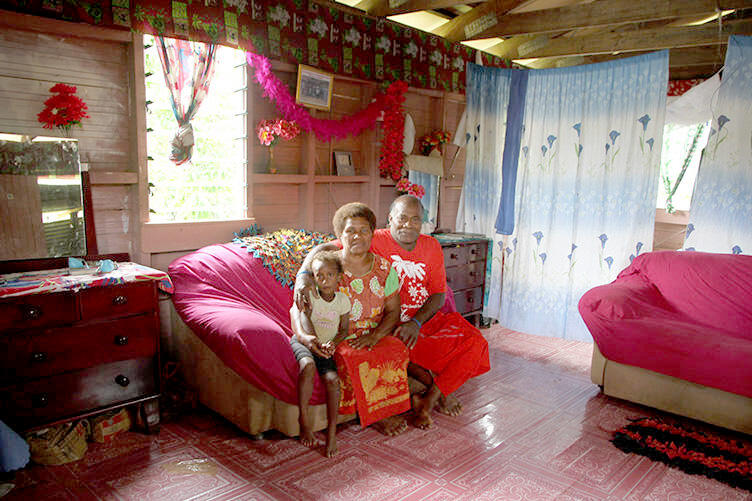 Peni and Vilomena Waqamaira and grandson 'at home.''