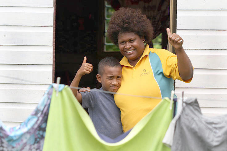 Teni and son at their front doorstep. Teni and son at their front doorstep.