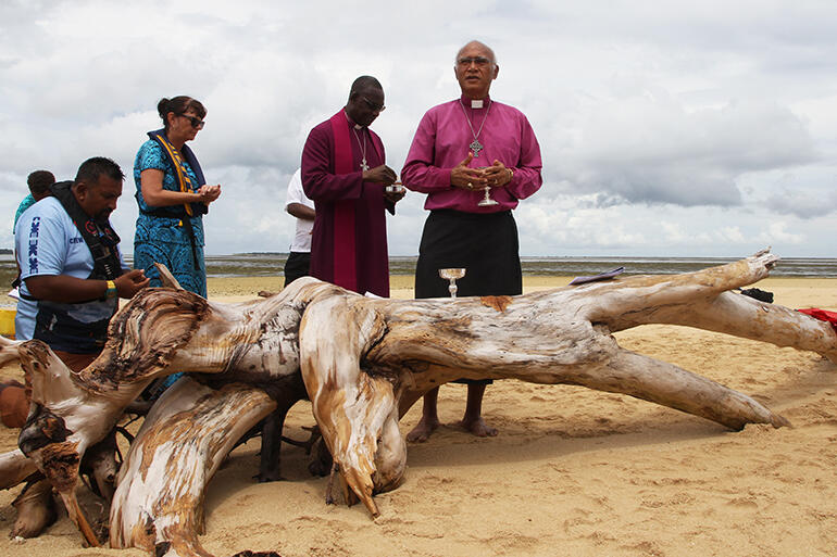 Archbishop Winston invites all to the Lord's Table.