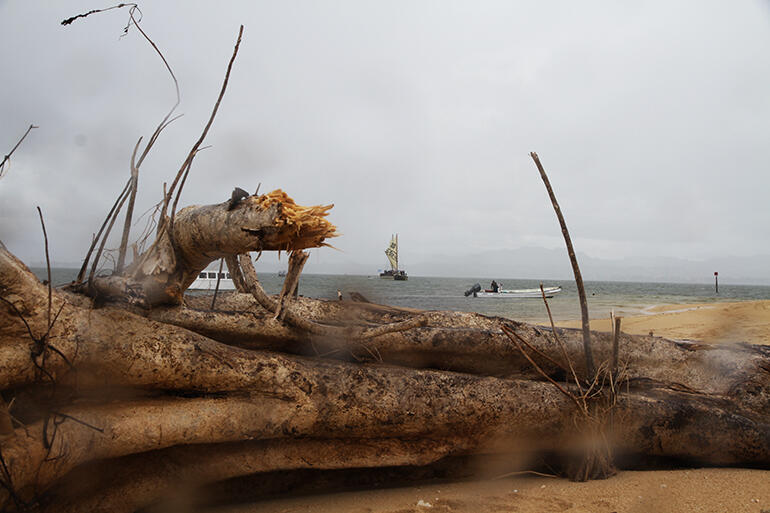 Squalls lash the Sandbank as the Uto Ni Yalo hoves into sight.