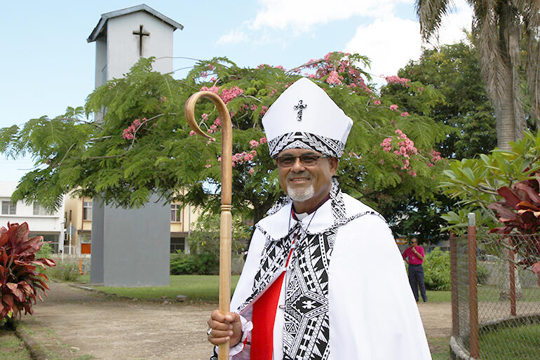 Bishop Henry in the grounds of St Thomas' Labasa - which is beside the school playground where the service was held.
