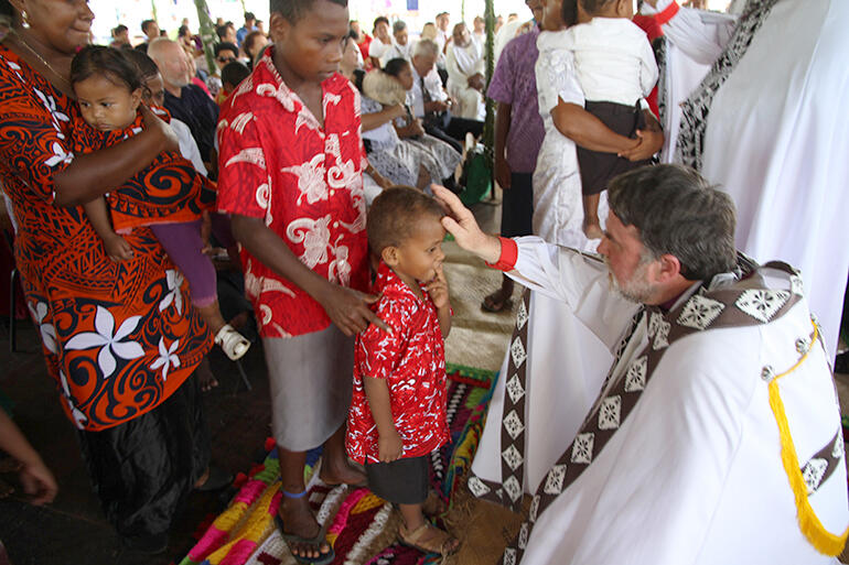 Industrial scale blessing - the six bishops invited every child to come forward for a blessing.