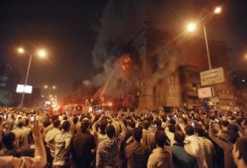 Churches blaze in Cairo as mobs turn against Christians. Photo: AP