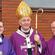 Catholics all: Fr Dominic (left) and Fr Ron (right) with Archbishop Vincent Nichols of Birmingham. Picture, News Team Int.