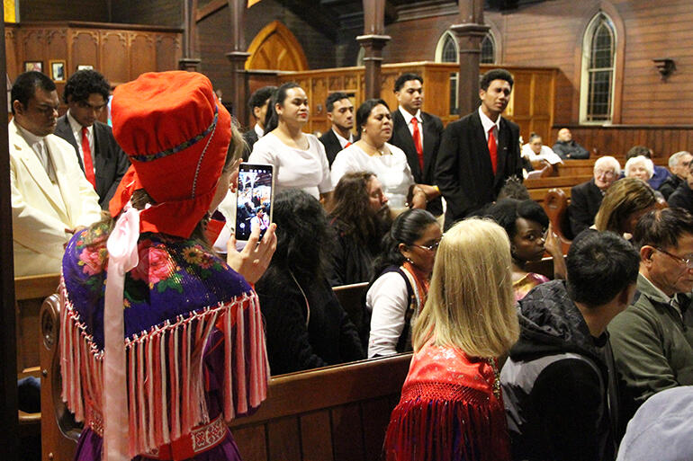 Helga West, who is a Sami woman from Finland, creates her memento of the evening at Holy Sep.