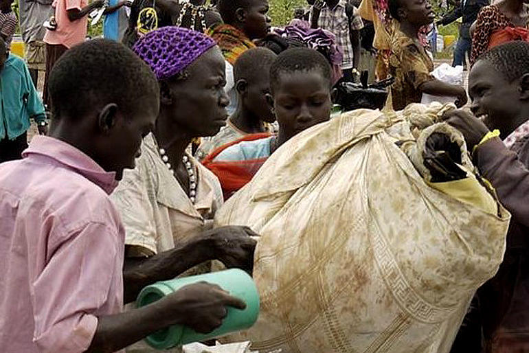 South Sudanese refugees check in at Elegu Crossing in 2016. Photo: ACT Alliance/P Akullo. South Sudanese refugees check in at Elegu Crossing in 2016. Photo: ACT Alliance/P Akullo.