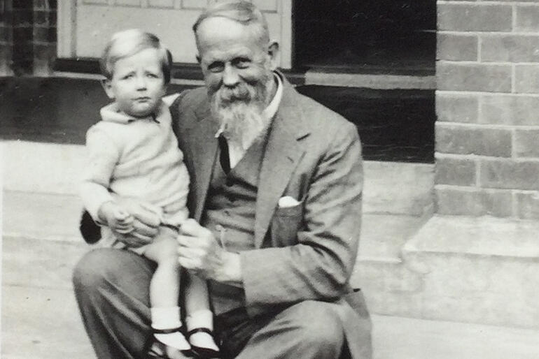 Young John Osmers sits with his mother's uncle, the Rev Charles Freer Andrews, champion of India's poor and friend of Ghandi.