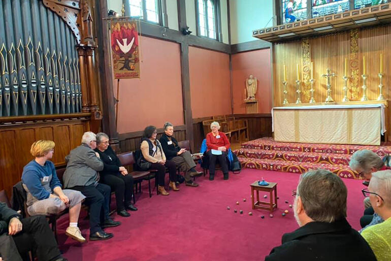 Dr Margaret Maclagan leads a workshop on contemplative prayer in the sanctuary of St Michael and All Angels' Church.