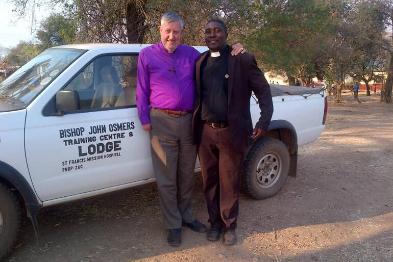 Bishop John Osmers stands with Vicar General of Eastern Zambia, Dean of St Luke's Cathedral Msoro, the Very Rev Edward Zimba.