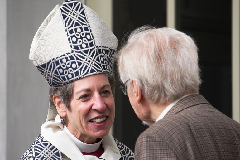 Bishop Katharine greets one of the long line of wellwishers after yesterday's Eucharist at Auckland's Holy Trinity Cathedral. Bishop Katharine greets one of the long line of wellwishers after yesterday's Eucharist at Auckland's Holy Trinity Cathedral.