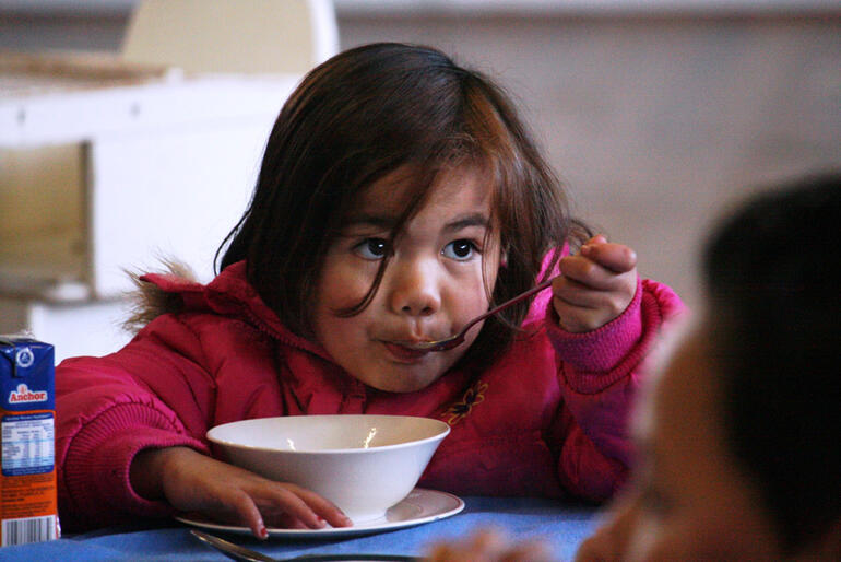 She may be contemplating the action elsewhere, but Tiaki Edwards appears to have a firm grip on her breakfast.