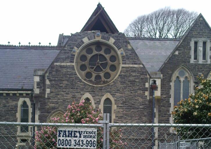 Arcbhishop David and General Secretary Michael Hughes could only gaze through the chain link fencing at Holy Trinity Avonside.