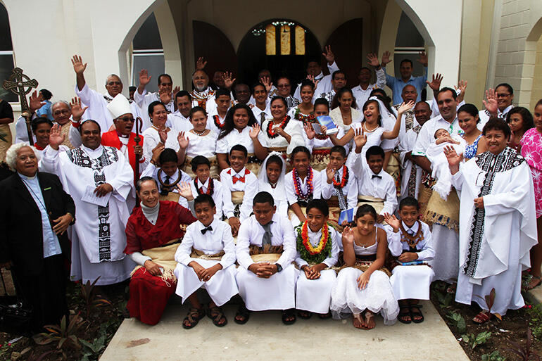 The newly confirmed gather for a photo outside the church on Sunday morning.