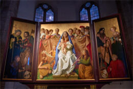 Winged wooden altar painting with modern subjects painted in richly coloured 15th century style