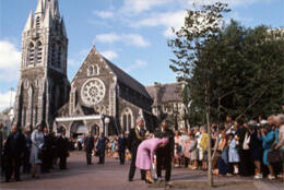 A historic colour photo of Catheral square shows the intact cathedral