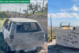 A car burnt till its paint is gone, a stone house wall coveredwith graffiti